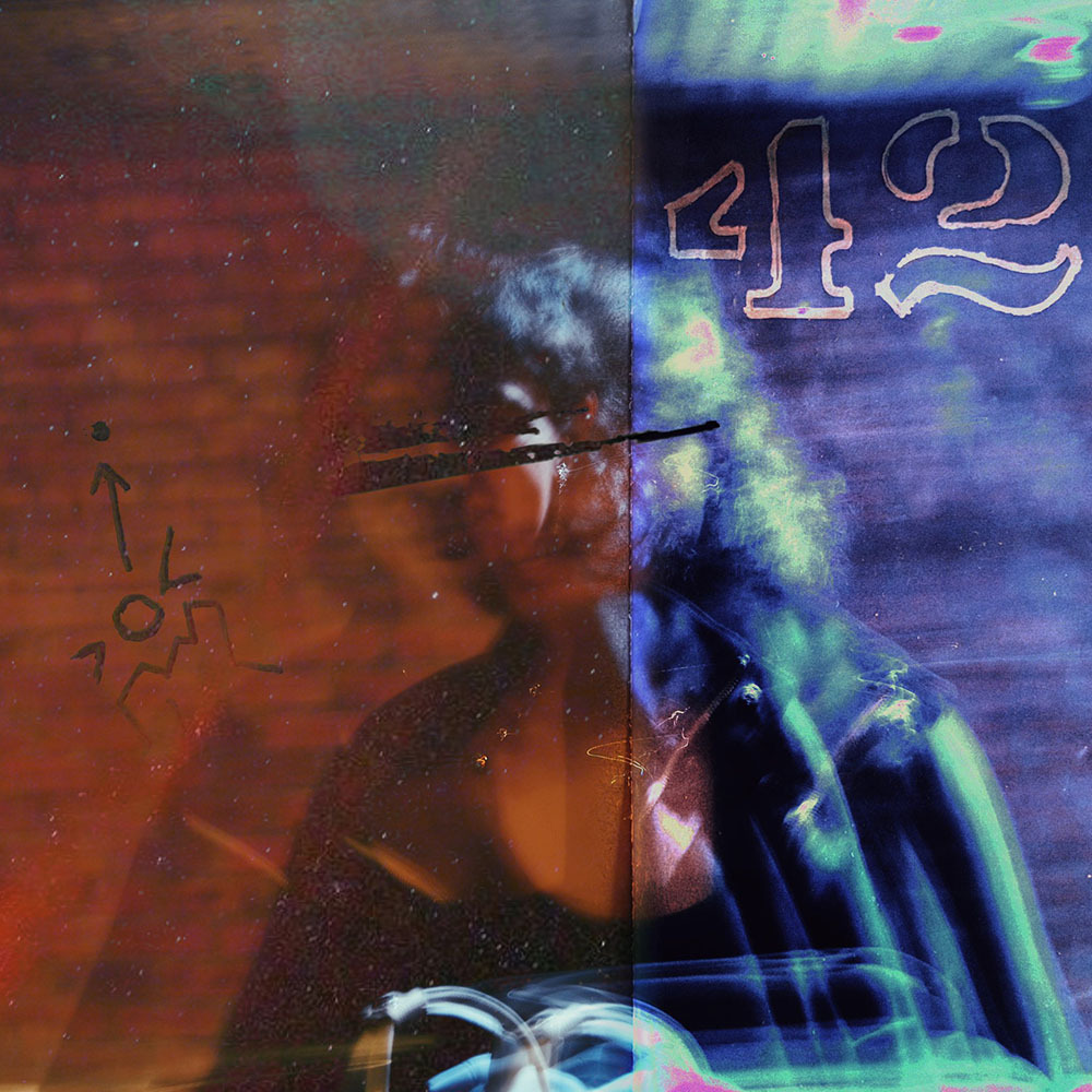 The right-half of the image blue with a 42. The main subject is obscured and blurry