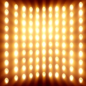 A grid of circular lights pointing toward the viewer